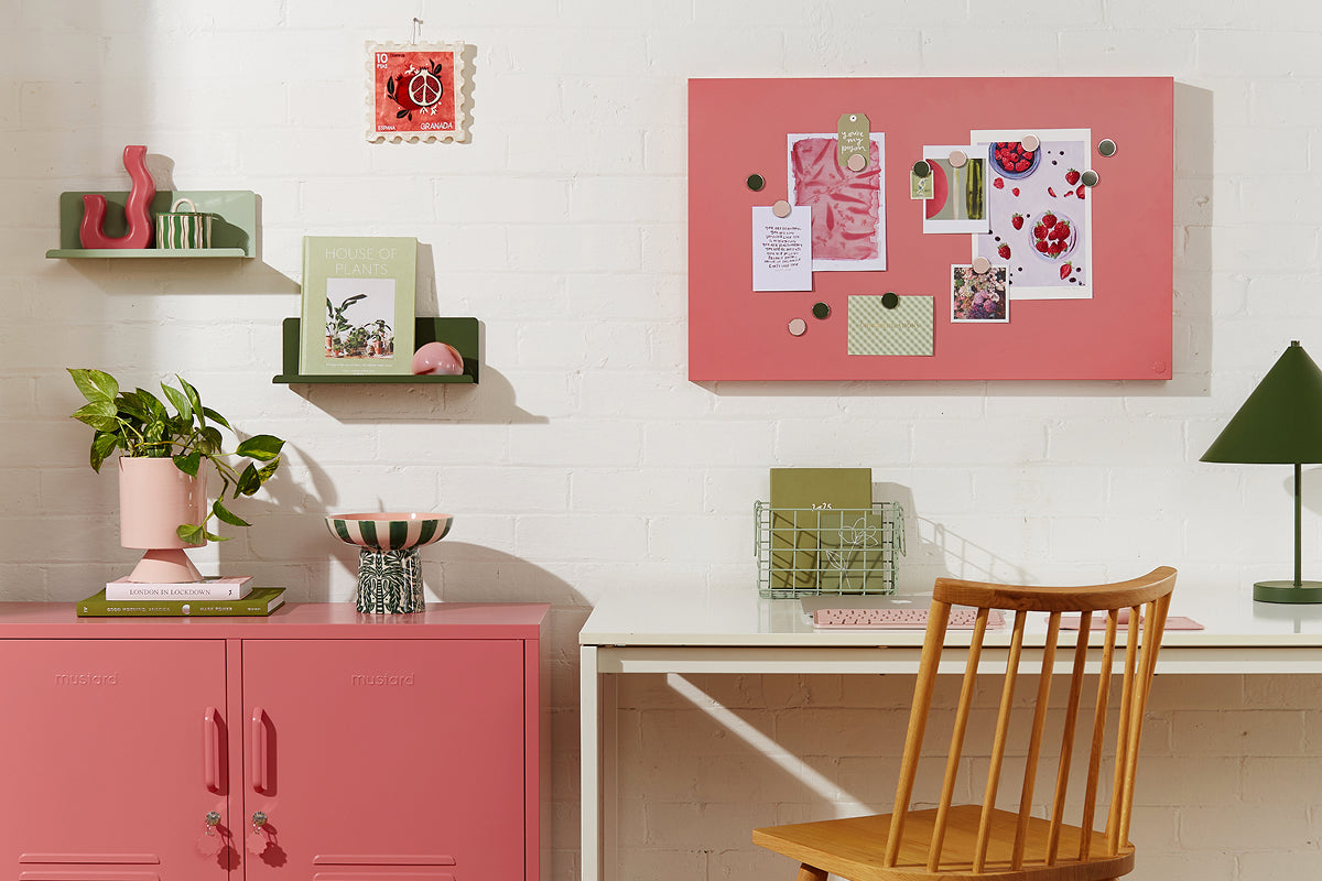 A styled study space with a Berry Lowdown locker, Sage and Olive Ledge shelves and a magnetic Storyboard above a wooden desk