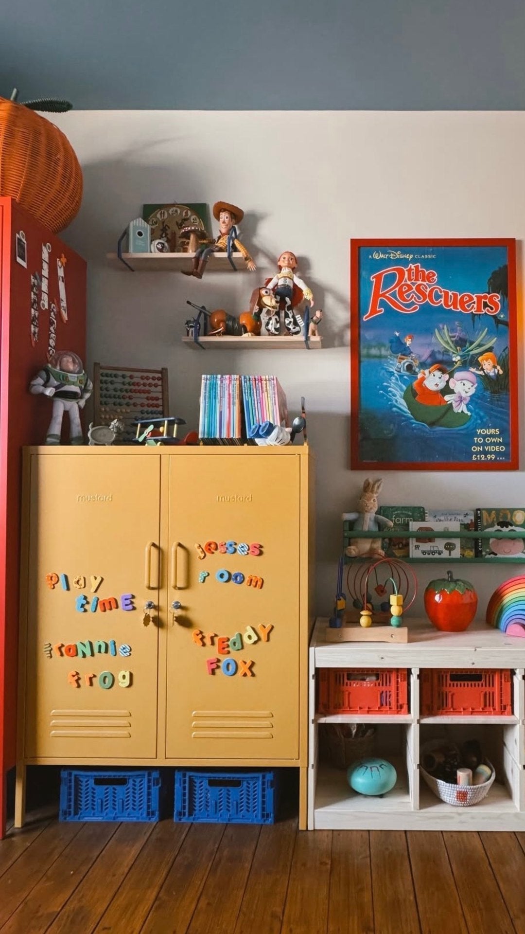 The Midi locker in Mustard yellow in a kids' playroom