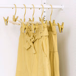 Cintres à clip pour adultes en beurre