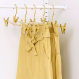 Cintres à clip pour adultes en beurre